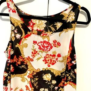 Floral print cool summer top. Suzy Shier size medium